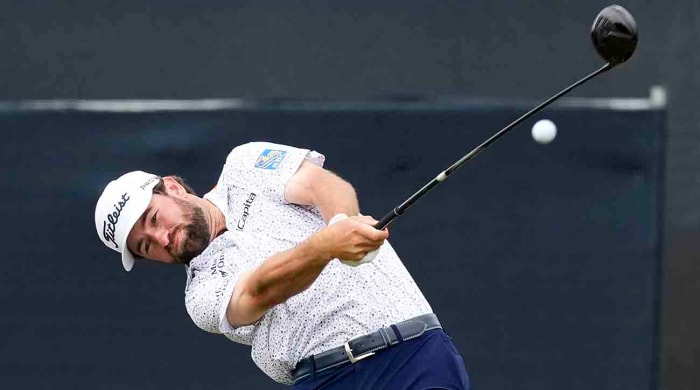 Cameron Young hits a drive at the 2023 U.S. Open.